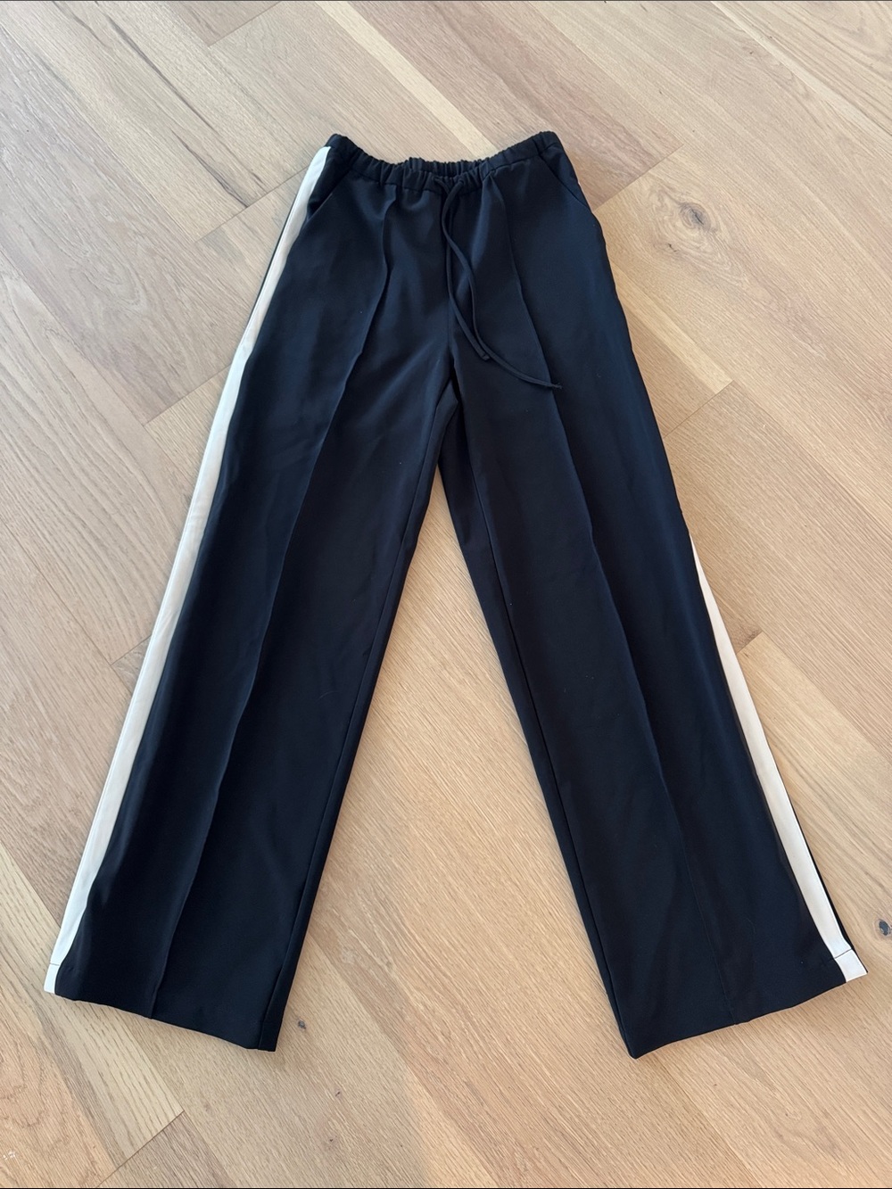 NWOT Athleta Black pants with White Side stripe